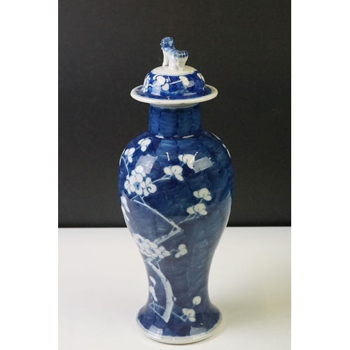 298 - Pair of Chinese Blue and White vases & covers, of inverted baluster form, with flowering prunus tree... 