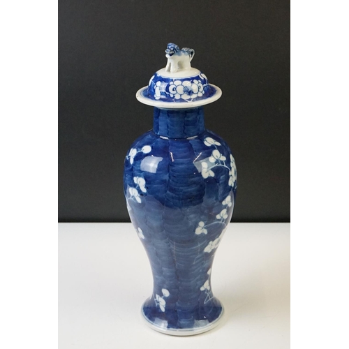 298 - Pair of Chinese Blue and White vases & covers, of inverted baluster form, with flowering prunus tree... 