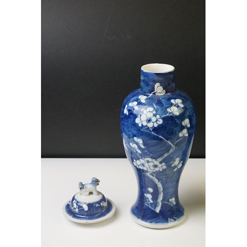 298 - Pair of Chinese Blue and White vases & covers, of inverted baluster form, with flowering prunus tree... 