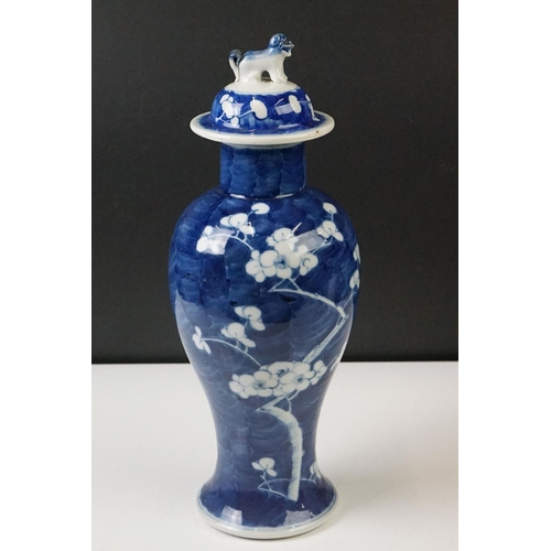 298 - Pair of Chinese Blue and White vases & covers, of inverted baluster form, with flowering prunus tree... 