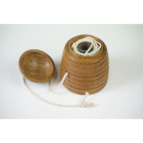 43 - A vintage turned wooden string holder / dispenser in the form of a beehive.