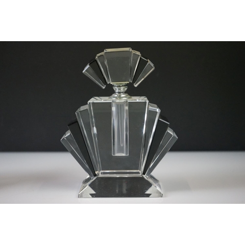 39 - Two Art Deco style scent bottles of geometric form. Each stands approx 15cm in height.