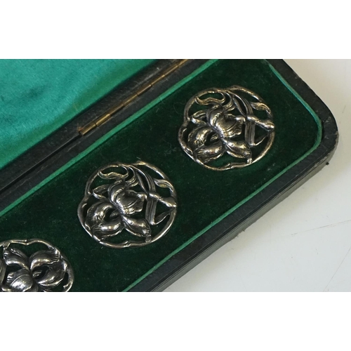 68 - A cased set of six fully hallmarked sterling silver buttons, maker marked for James Deakin & Sons (J... 