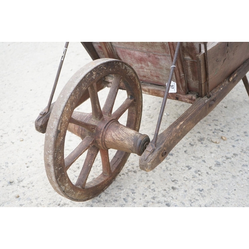 97 - Traditional Wooden Wheelbarrow with through jointed frame, wooden spoke wheel with iron rim and remo... 