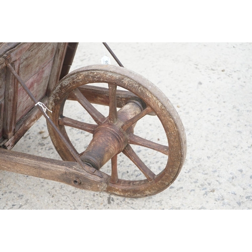 97 - Traditional Wooden Wheelbarrow with through jointed frame, wooden spoke wheel with iron rim and remo... 