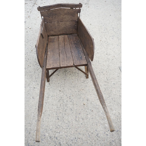 97 - Traditional Wooden Wheelbarrow with through jointed frame, wooden spoke wheel with iron rim and remo... 