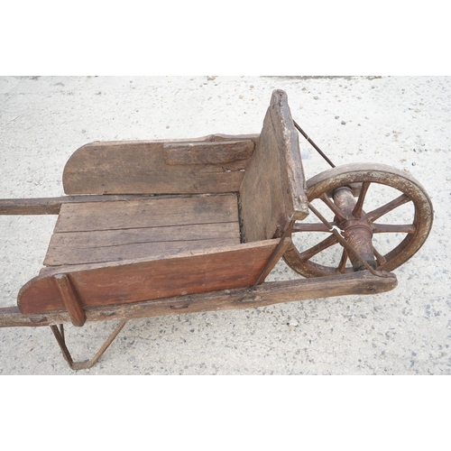 97 - Traditional Wooden Wheelbarrow with through jointed frame, wooden spoke wheel with iron rim and remo... 