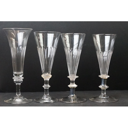 54 - Collection of Thirty 19th Century Ale / Champagne Flutes with facet-cut bowls, knop stems and ground... 