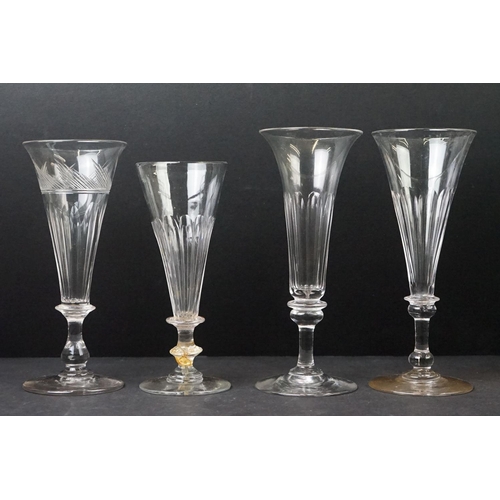 54 - Collection of Thirty 19th Century Ale / Champagne Flutes with facet-cut bowls, knop stems and ground... 