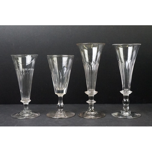 54 - Collection of Thirty 19th Century Ale / Champagne Flutes with facet-cut bowls, knop stems and ground... 