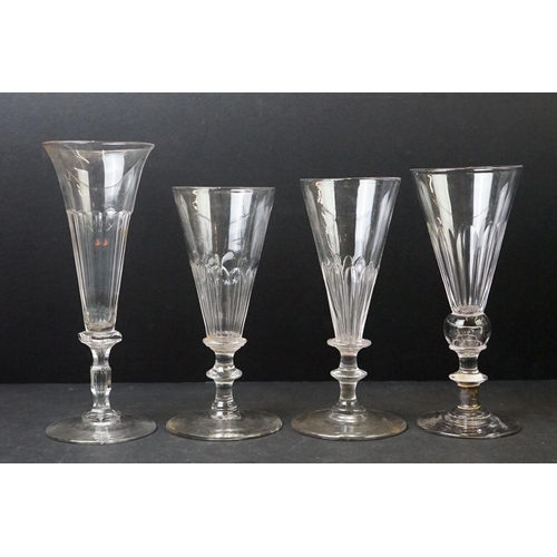 54 - Collection of Thirty 19th Century Ale / Champagne Flutes with facet-cut bowls, knop stems and ground... 