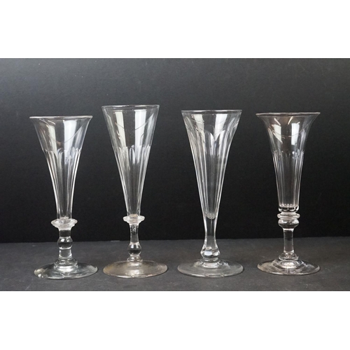 54 - Collection of Thirty 19th Century Ale / Champagne Flutes with facet-cut bowls, knop stems and ground... 