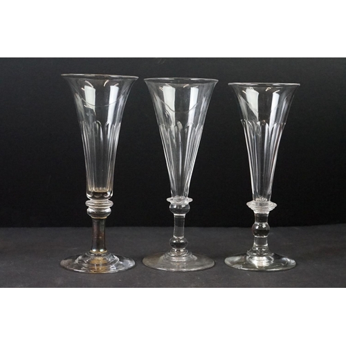 54 - Collection of Thirty 19th Century Ale / Champagne Flutes with facet-cut bowls, knop stems and ground... 