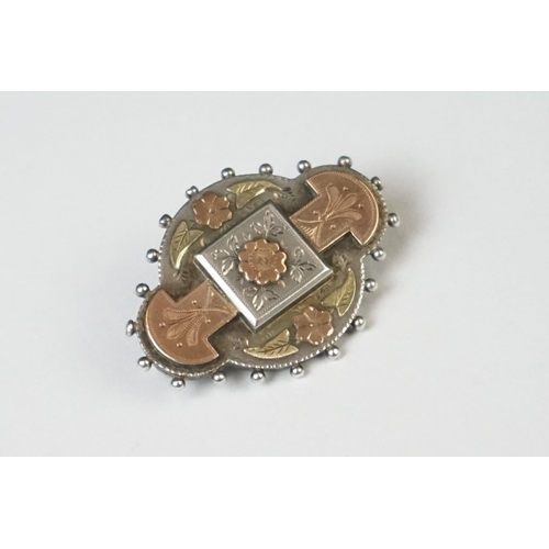 70 - A fully hallmarked sterling silver mourning brooch with rose and yellow gold decoration, assay marke... 