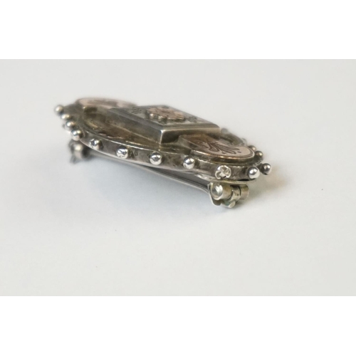 70 - A fully hallmarked sterling silver mourning brooch with rose and yellow gold decoration, assay marke... 