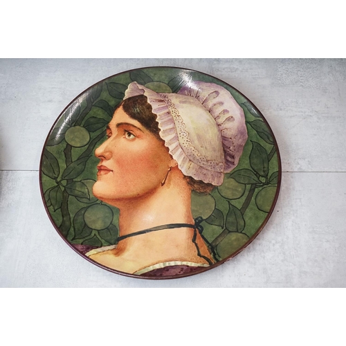 136 - Late 19th Century Doulton Lambeth Charger hand painted with the portrait of a woman, JC monogram to ... 