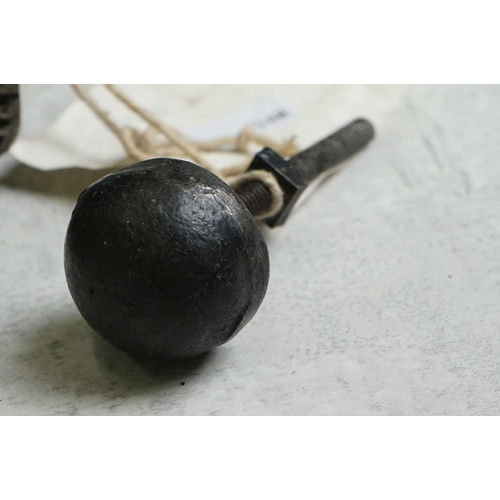 156 - Cast Iron Door Knocker and Striker modelled as a hand & orb (knocker measures approx 12.5cm long)