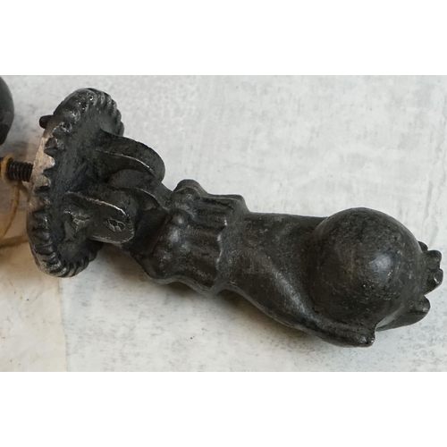 156 - Cast Iron Door Knocker and Striker modelled as a hand & orb (knocker measures approx 12.5cm long)