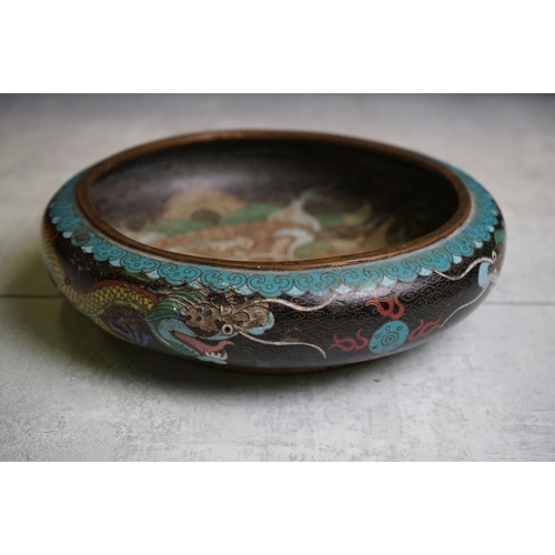 194 - Chinese Cloisonne Bowl decorated with dragons on a blue and black ground, four character marks to ba... 