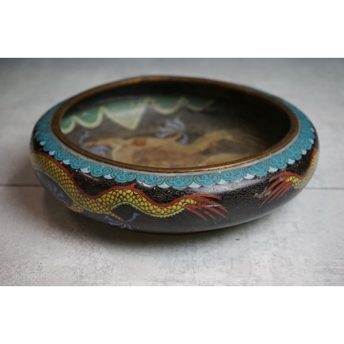 194 - Chinese Cloisonne Bowl decorated with dragons on a blue and black ground, four character marks to ba... 