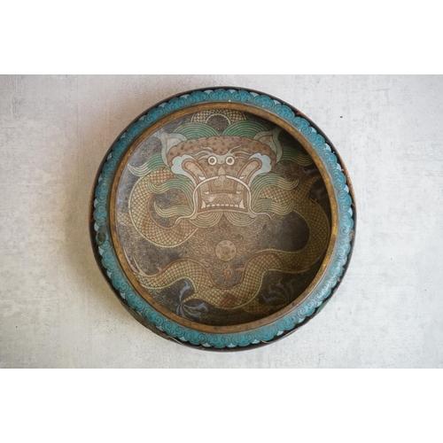 194 - Chinese Cloisonne Bowl decorated with dragons on a blue and black ground, four character marks to ba... 