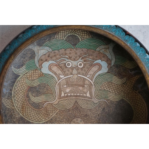 194 - Chinese Cloisonne Bowl decorated with dragons on a blue and black ground, four character marks to ba... 