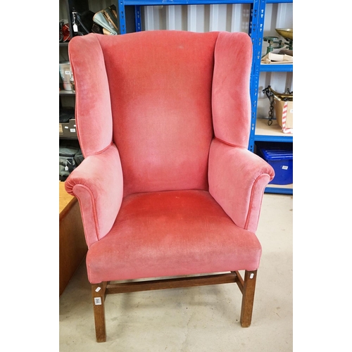 592 - Edwardian Wingback Armchair in the George III manner, upholstered in pink fabric, raised on square l... 