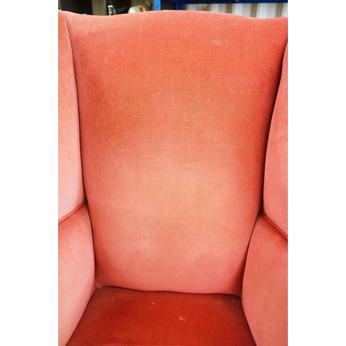 592 - Edwardian Wingback Armchair in the George III manner, upholstered in pink fabric, raised on square l... 