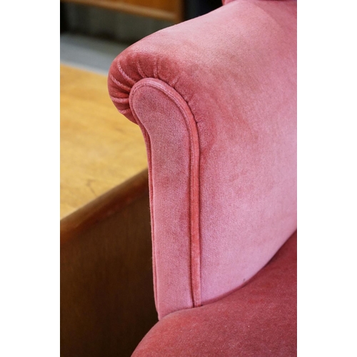 592 - Edwardian Wingback Armchair in the George III manner, upholstered in pink fabric, raised on square l... 