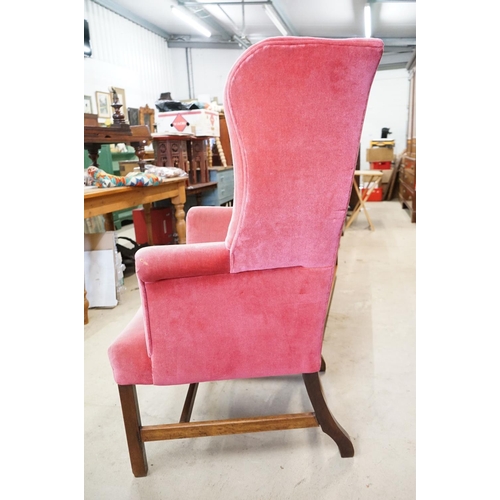 592 - Edwardian Wingback Armchair in the George III manner, upholstered in pink fabric, raised on square l... 