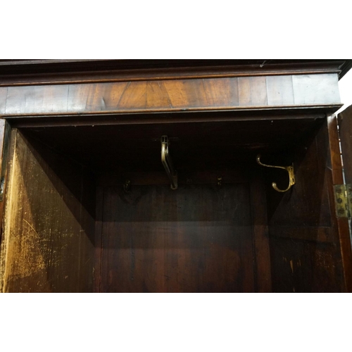 599 - George III Mahogany Linen Press, the upper section later converted to half hanging space and half sh... 