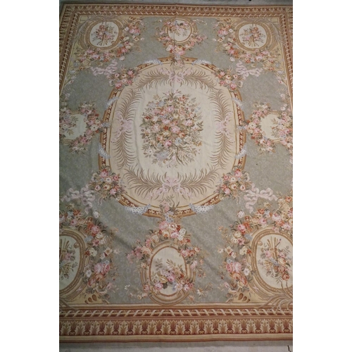 602 - Large French  Aubusson style Tapestry, the green ground with panels of floral sprays within a stylis... 