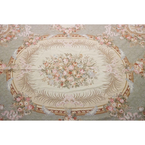 602 - Large French  Aubusson style Tapestry, the green ground with panels of floral sprays within a stylis... 