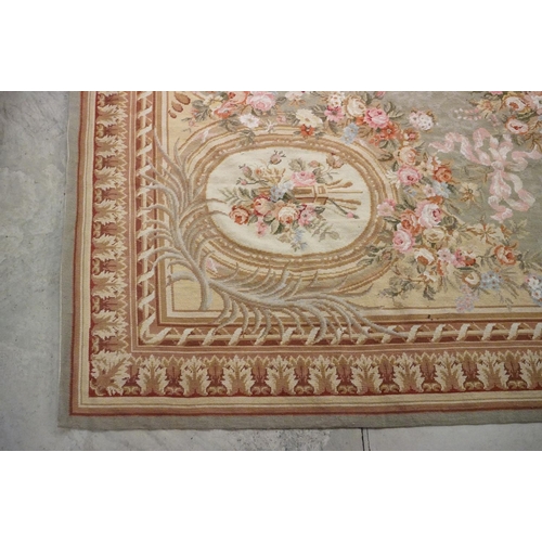 602 - Large French  Aubusson style Tapestry, the green ground with panels of floral sprays within a stylis... 