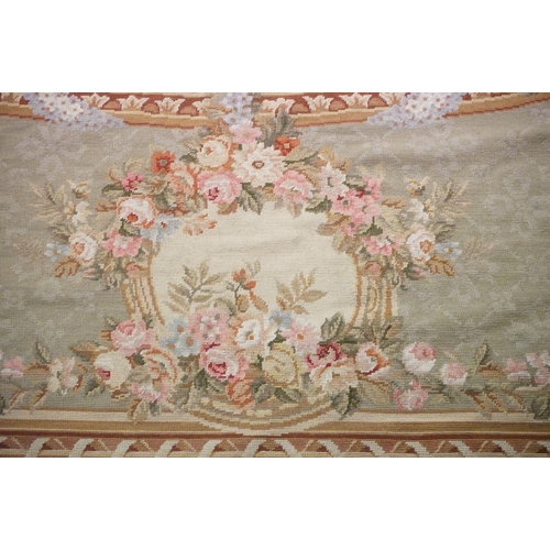 602 - Large French  Aubusson style Tapestry, the green ground with panels of floral sprays within a stylis... 