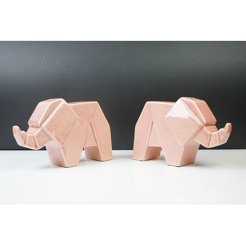 12A - Pair of Art Deco pink crackle-glazed ceramic elephants, of geometric form, 16cm high