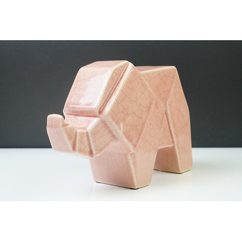 12A - Pair of Art Deco pink crackle-glazed ceramic elephants, of geometric form, 16cm high