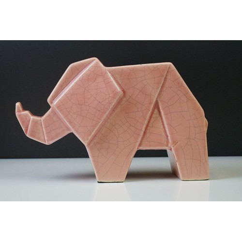 12A - Pair of Art Deco pink crackle-glazed ceramic elephants, of geometric form, 16cm high