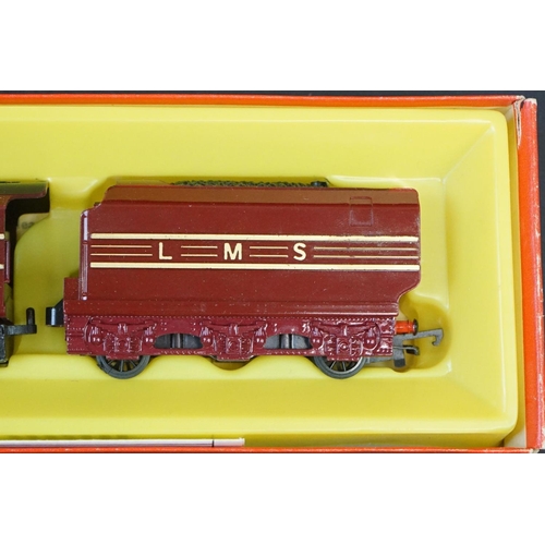 30 - Four boxed Triang Hornby locomotives to include R871 LMS 4-6-2 Coronation Locomotive in maroon, 2 x ... 