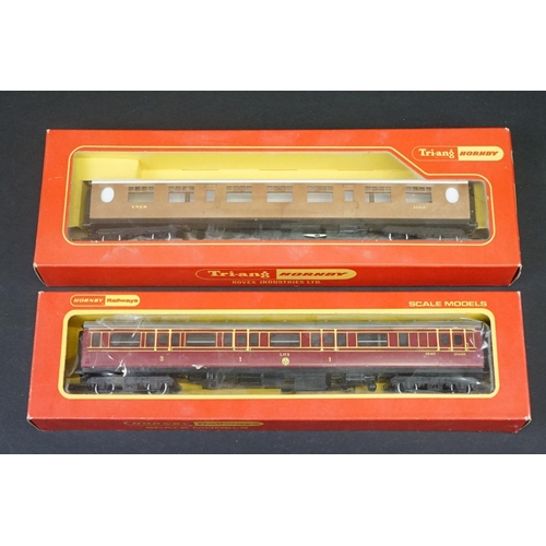 46 - 33 Boxed OO gauge items of rolling stock featuring coaches, wagons and vans to include 29 x Hornby /... 