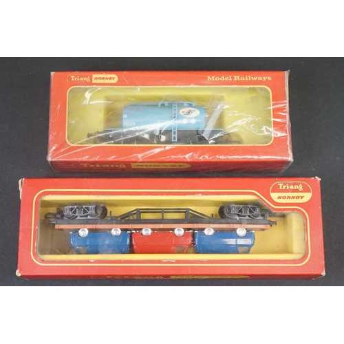 46 - 33 Boxed OO gauge items of rolling stock featuring coaches, wagons and vans to include 29 x Hornby /... 