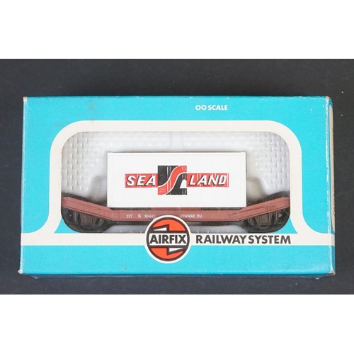 46 - 33 Boxed OO gauge items of rolling stock featuring coaches, wagons and vans to include 29 x Hornby /... 