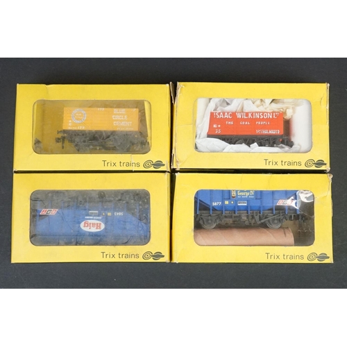 46 - 33 Boxed OO gauge items of rolling stock featuring coaches, wagons and vans to include 29 x Hornby /... 