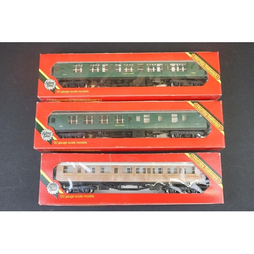 46 - 33 Boxed OO gauge items of rolling stock featuring coaches, wagons and vans to include 29 x Hornby /... 