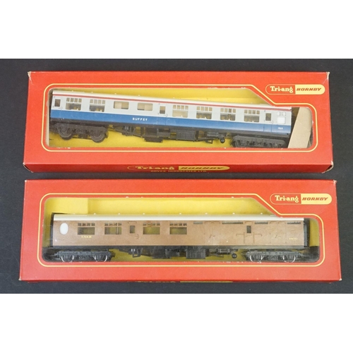 46 - 33 Boxed OO gauge items of rolling stock featuring coaches, wagons and vans to include 29 x Hornby /... 