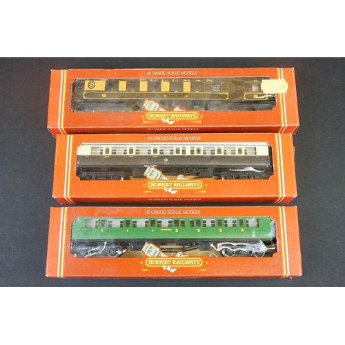 46 - 33 Boxed OO gauge items of rolling stock featuring coaches, wagons and vans to include 29 x Hornby /... 