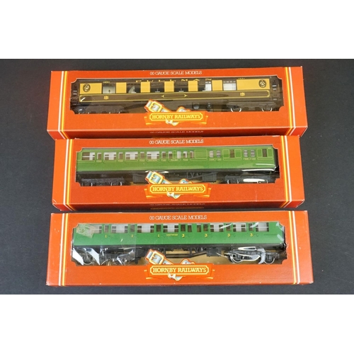 46 - 33 Boxed OO gauge items of rolling stock featuring coaches, wagons and vans to include 29 x Hornby /... 