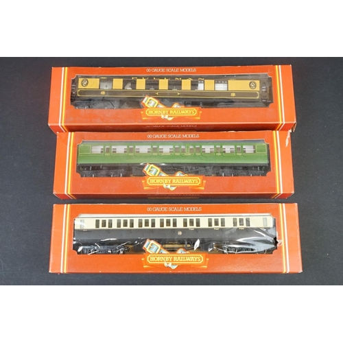 46 - 33 Boxed OO gauge items of rolling stock featuring coaches, wagons and vans to include 29 x Hornby /... 