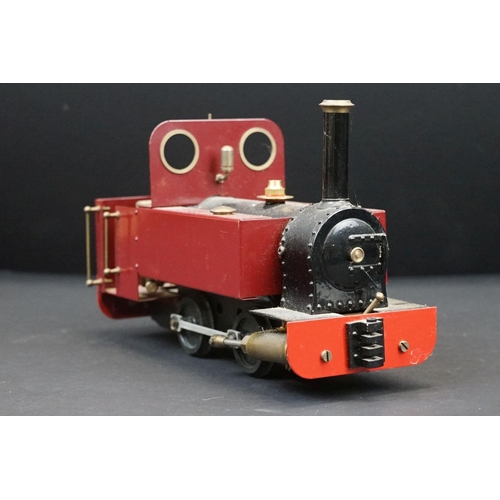 69 - Unmarked metal O gauge 0-4-0 locomotive with tender, in maroon, possibly a near complete Mamod Steam... 