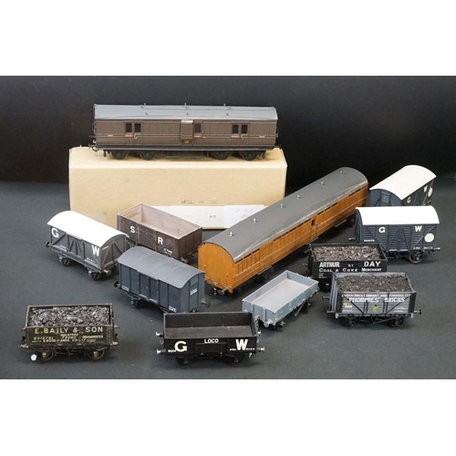 99 - 12 O gauge items of kit built rolling stock featuring trucks, vans and a K4 Dean PBV in brown livery... 